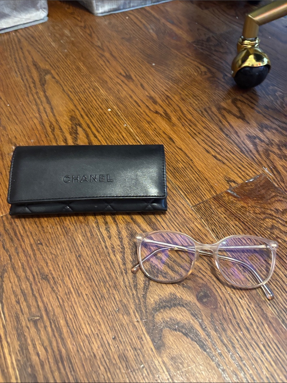 CHANEL Women's Clear Frame Glasses with Subtle Purple Tint